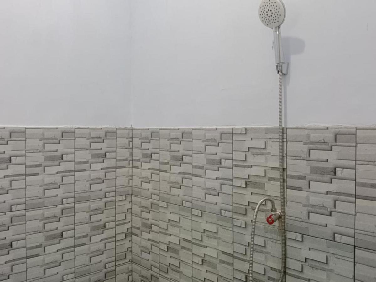 Zulfina Homestay Syariah Mitra Reddoorz 外南梦 外观 照片
